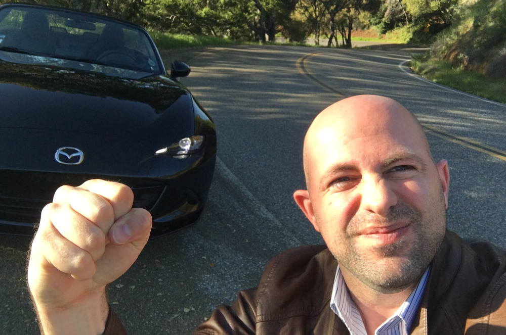 Josh Fist Pumping with a Mazda MX-5 Miata