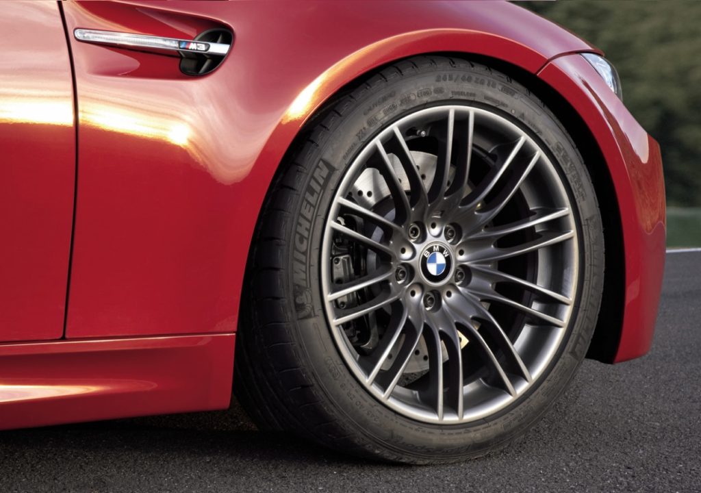 Forged wheels and 2-piece rotors on a red E92 M3